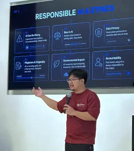 Jon Bonso delivers a keynote presentation on Responsible AI and Ethics, explaining AI bias, data privacy, plagiarism, environmental impact, and accountability during an AI education event.