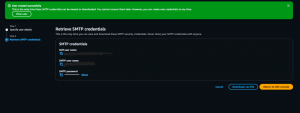 Screenshot of the dark mode AWS console page titled "Retrieve SMTP credentials" with a green success banner reading "User created successfully" at the top.