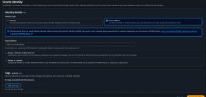 Screenshot of the Amazon Simple Email Service (SES) "Create identity" form in dark mode. Under "Identity type," the radio button for "Email address" is selected. An informational banner warns about DMARC policies when sending from an unverified domain. Below it is an empty "Email address" input field, followed by unchecked checkboxes for "Assign a default configuration set" and "Assign to a tenant," and an optional "Tags" section with an "Add new tag" button at the bottom left.